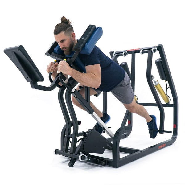 Man posing on a Keiser A300 Runner