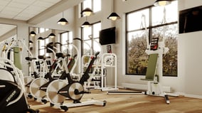 Perspective of a room with Keiser fitness equipment for an older adult facility - in a mid-sized room