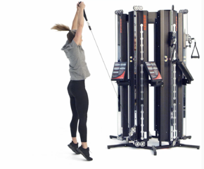 Woman performing a Goblet Squat to Press on a Keiser Performance Trainer in a six pack configuration