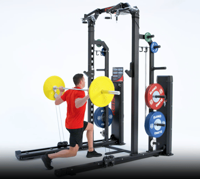 man performing mixed-mass lunges on a Keiser Half Rack