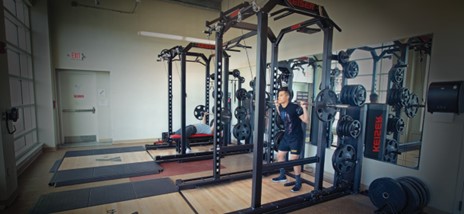 A training room at the Quincy YMCA with Keiser pneumatic and free weight racks. 