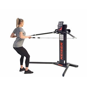 woman performing Standing Row at Keiser cable machine
