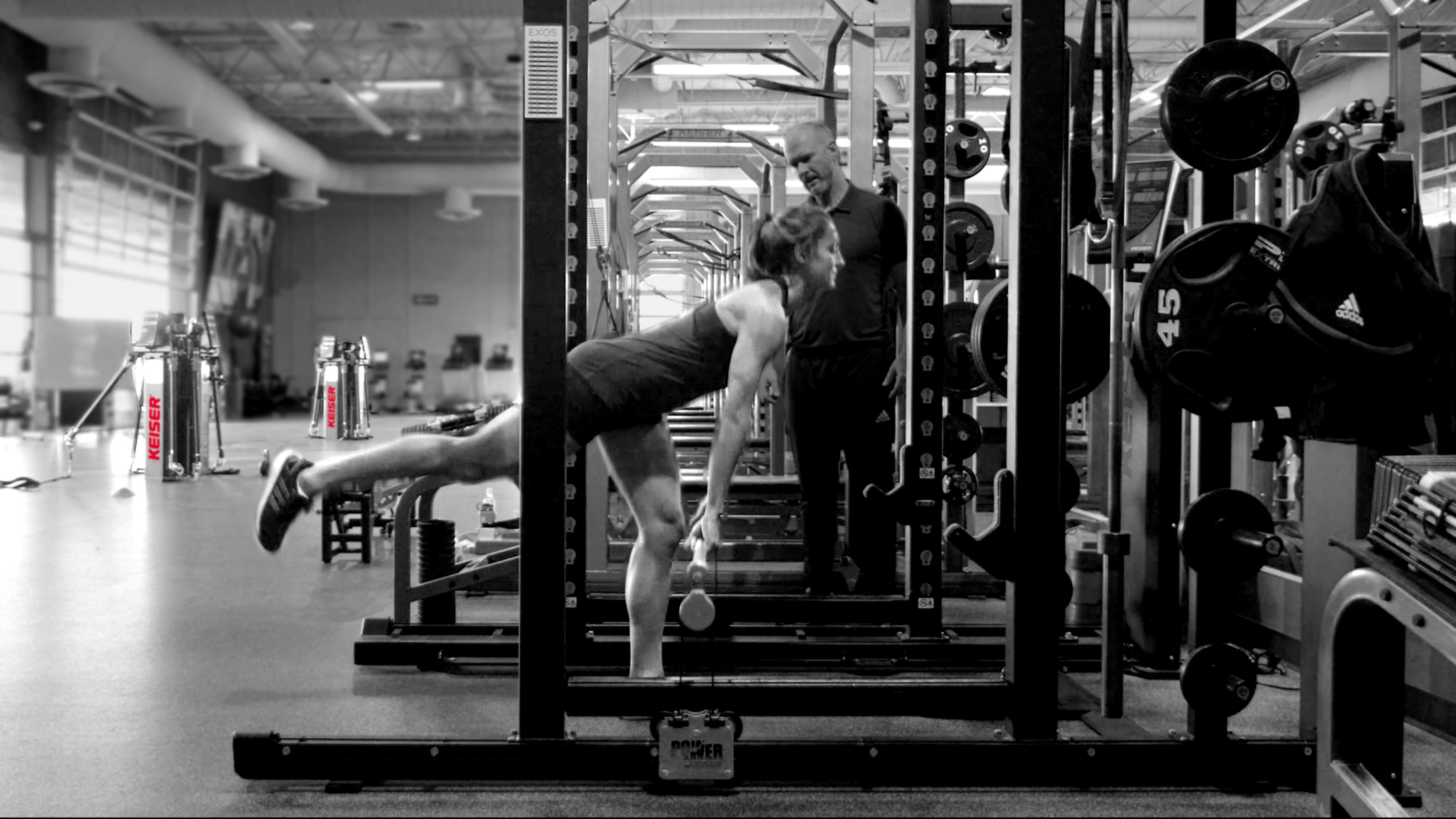 Woman Balancing On Rack 