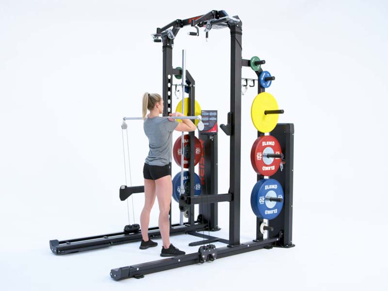 Woman on Rack performing pneumatic resisted front squat