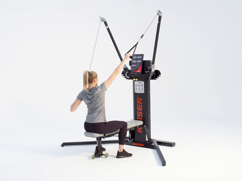 Woman on Functional Trainer conducting Alternating-Seated-High-to-Low-Row